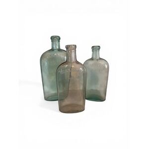Set of 3 Vintage Warranted Flask Antique Glass Bottles Aqua Clear Embossed Decor